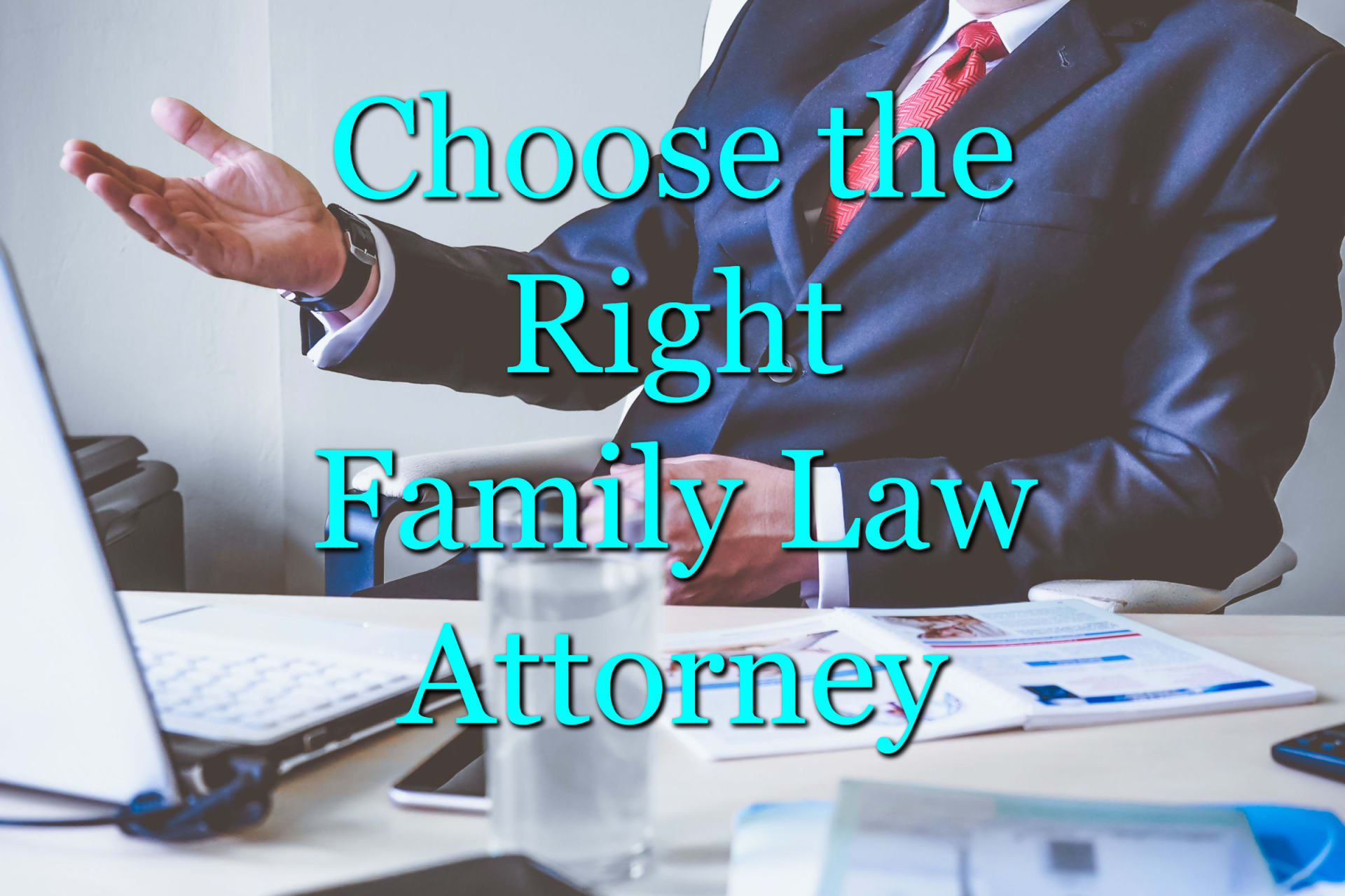 A man at a desk explaining how to choose a family law attorney
